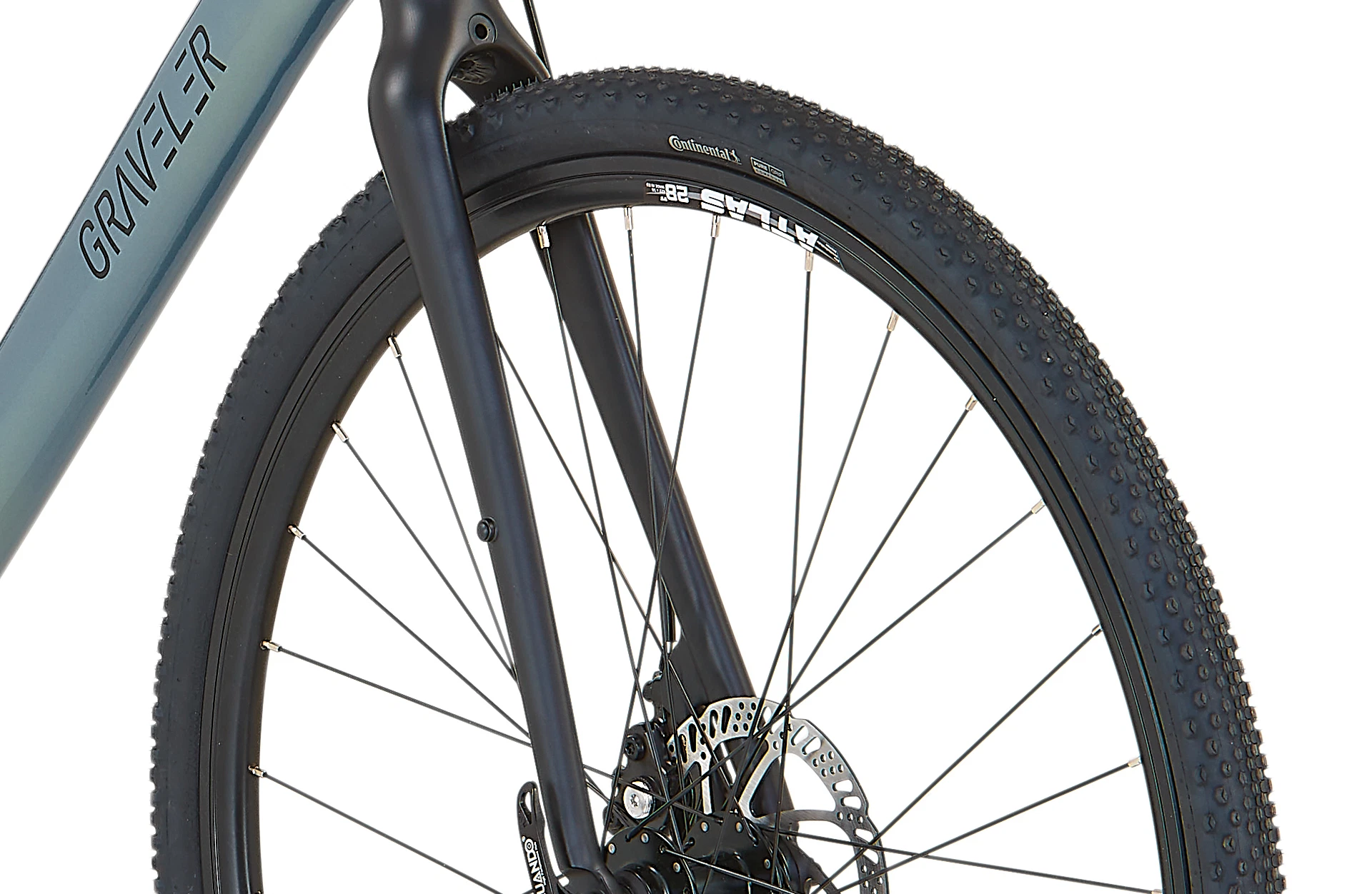 Bildausschnitt Detailansicht Gabel und Vorderrad mit Profil der Bereifung vor weißem Hintergrund